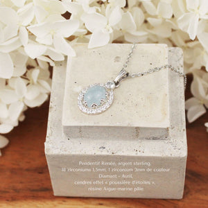 Bijoux Souvenirs Particella, pendentif Renée, argent sterling, 18 zircons 1,5mm, 1 cubique zirconium de couleur Diamant - Avril, cendres effet "poussière d'étoiles, résine Aigue-marine.